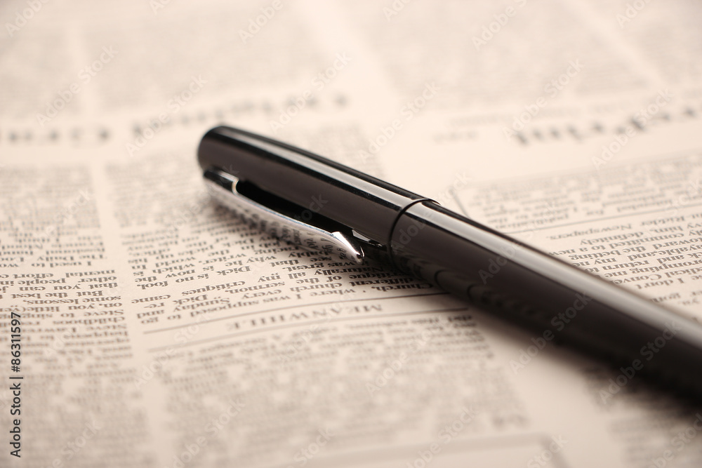 Fototapeta premium Pen on newspaper