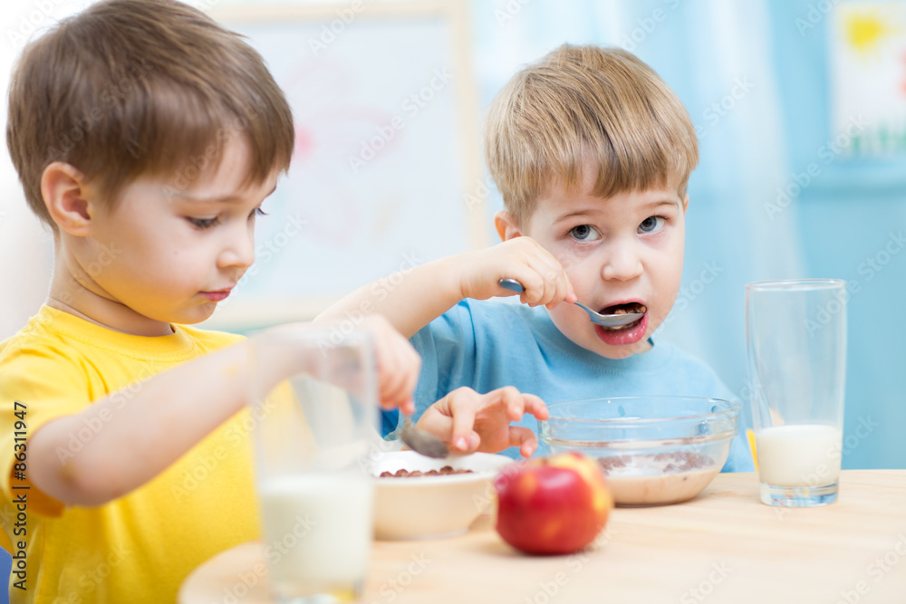 cute children eat healthy food enjoying breakfast cute children eat healthy food enjoying breakfast