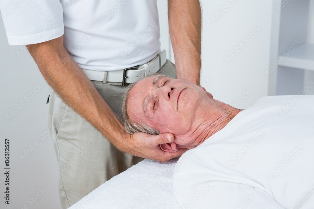 Fototapeta premium Man receiving neck massage 