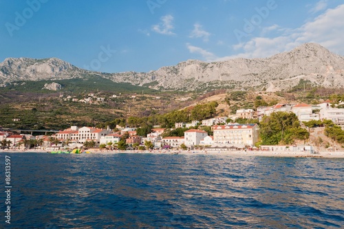 Village Podgora with hotels and Biokovo mountain in background. Podgora is a popular holiday resort in Croatia