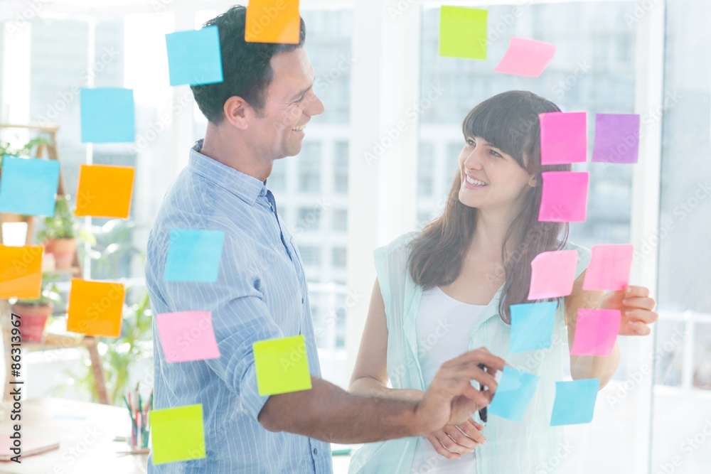 Young creative business people writing photo editor Young creative business people writing photo editor