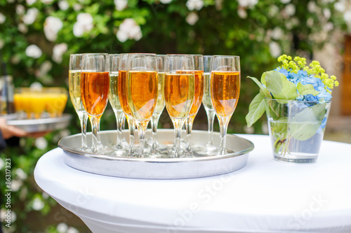 Schilderij op canvas Dish with champagne and wine glasses