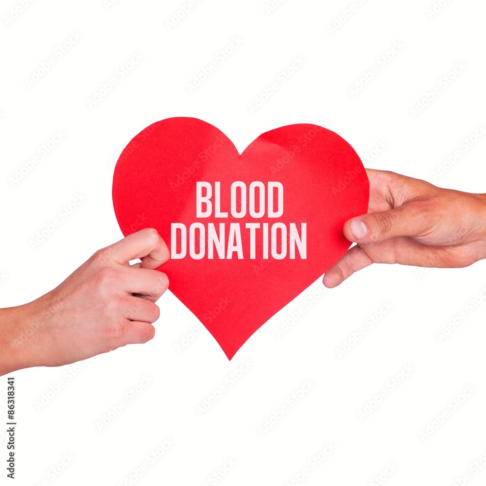 Composite image of hands holding red heart Composite image of hands holding red heart