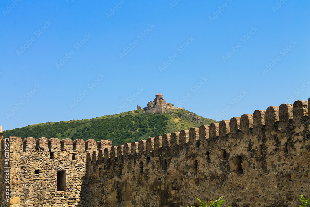 Jvari monastery over the the fortress wall