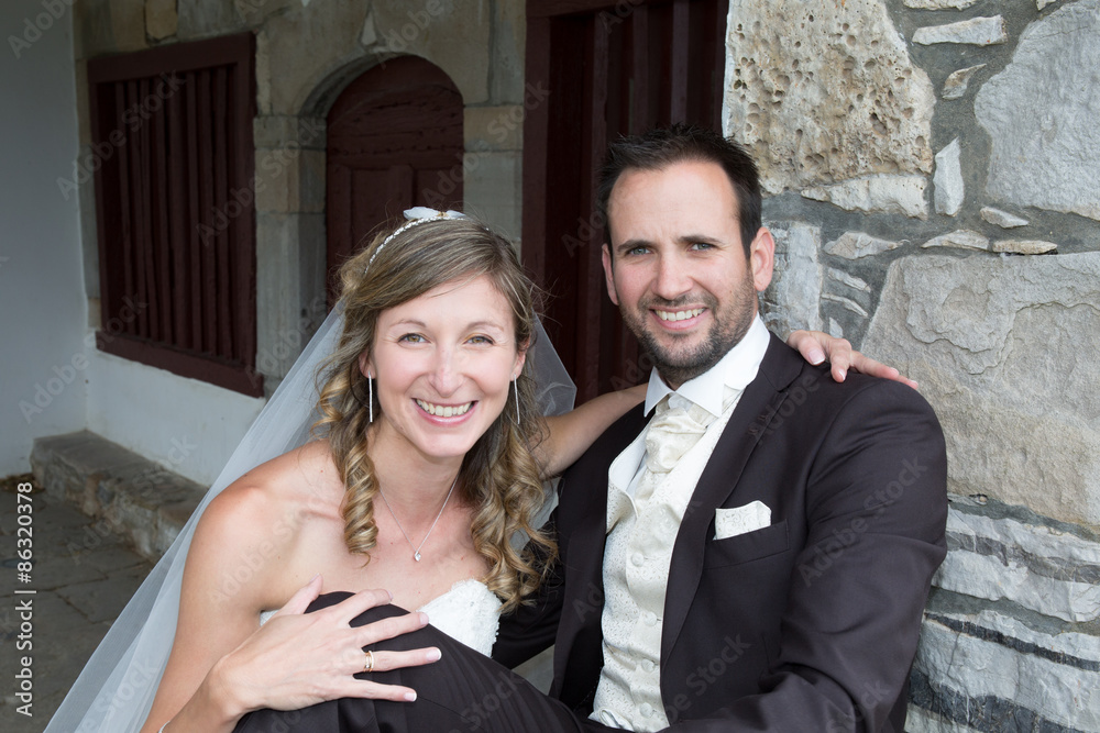 Beautiful happy and charming couple on wedding day Beautiful happy and charming couple on wedding day