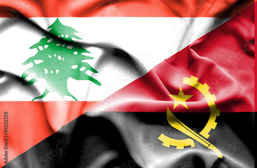 Waving flag of Angola and Lebanon