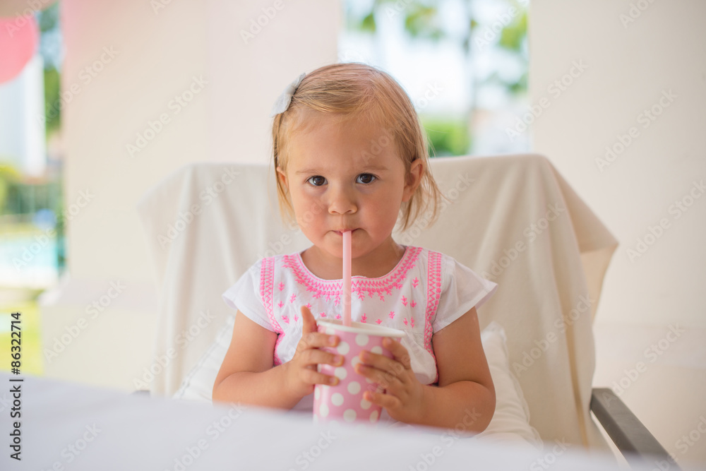 Little Toddler Drinking Juice From Paper Cup