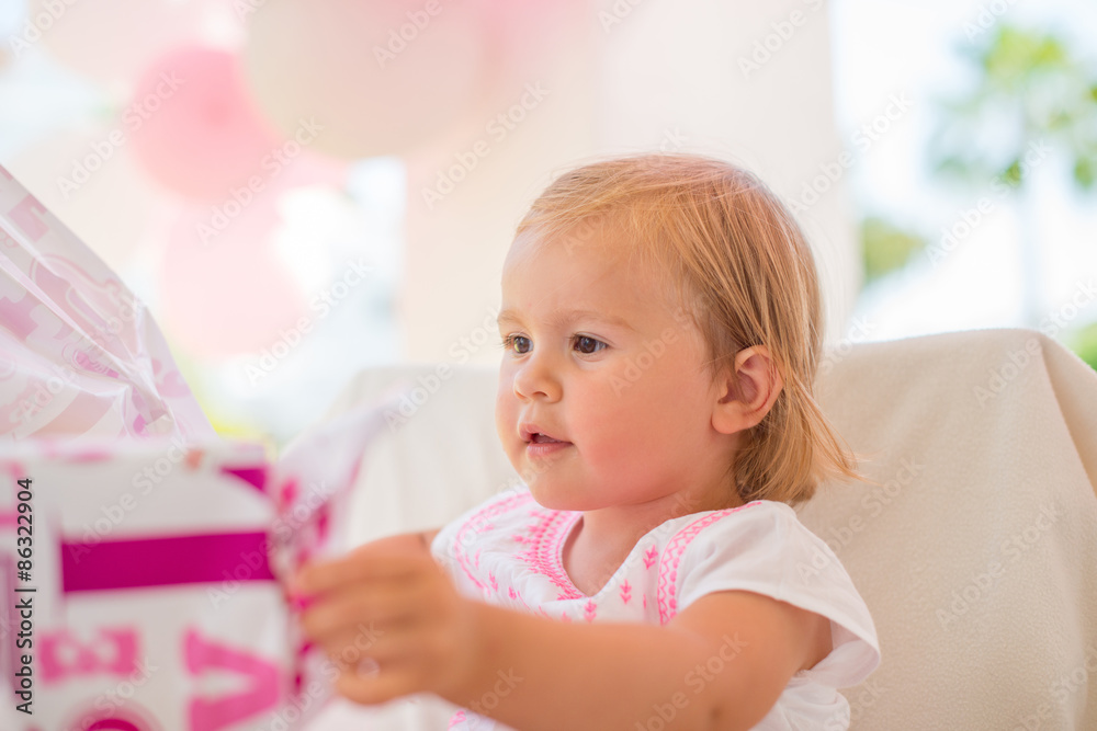 Excited Cutie Unwrapping Her Birthday Present Excited Cutie Unwrapping Her Birthday Present