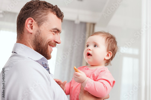 Nice father holding baby  © Viacheslav Yakobchuk