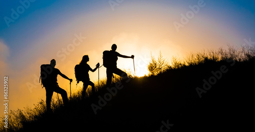 Photography Climbers on grassy hill