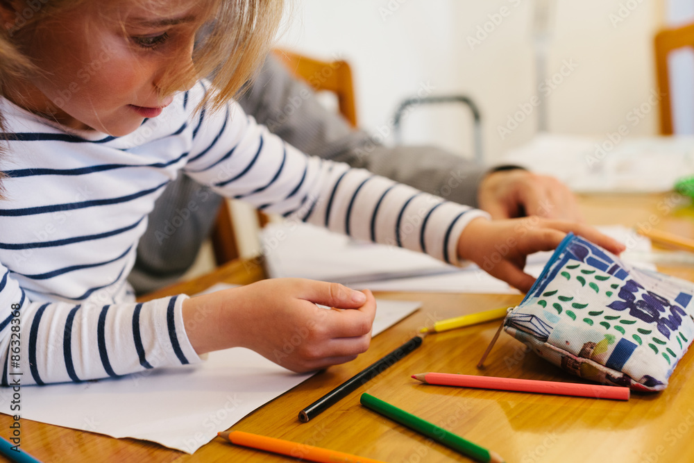 Little Cute Girl Doing Homework with Her Father Little Cute Girl Doing Homework with Her Father