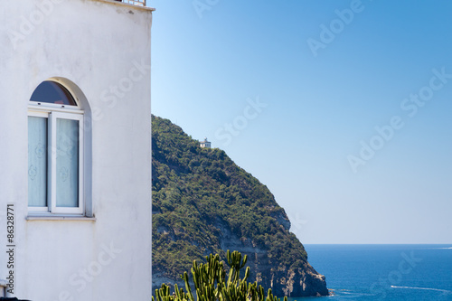 Lighthouse atop a cliff on the Italian island of Ischia in the B