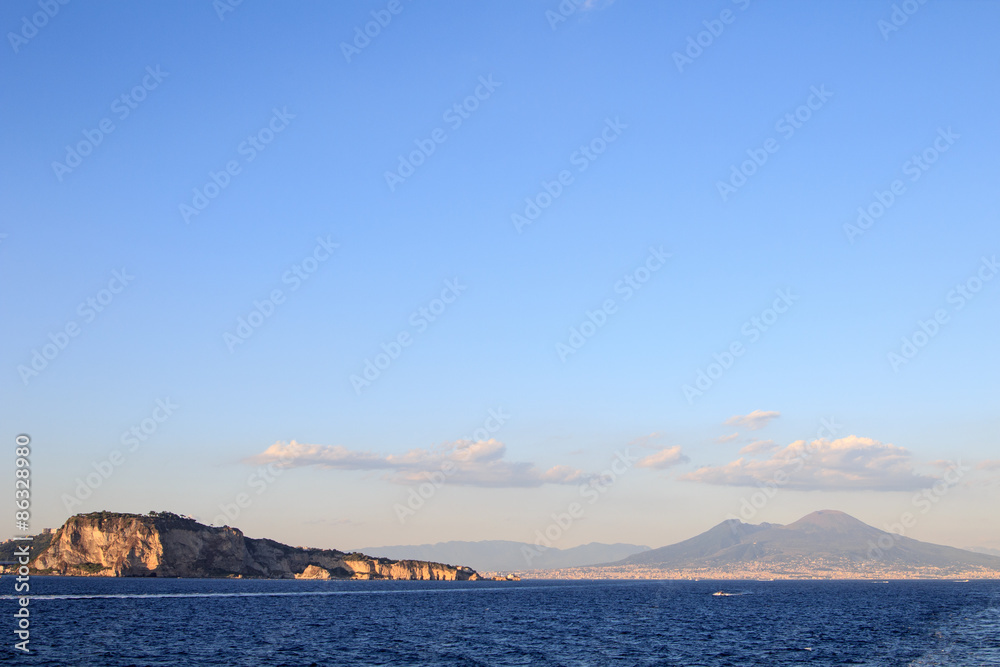 View of mount Vesuvius from a boat in the Naples bay View of mount Vesuvius from a boat in the Naples bay