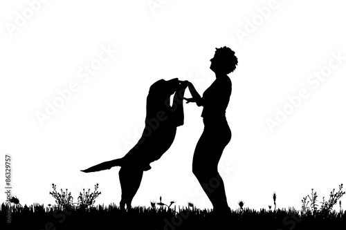 Vector silhouette of a woman with a dog.