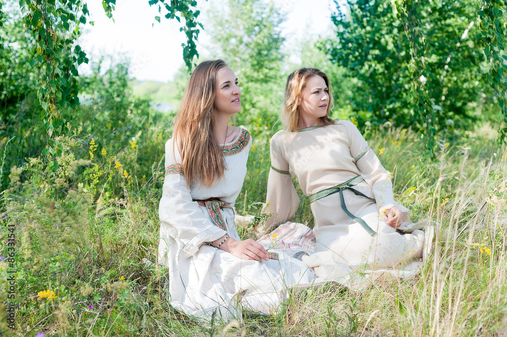 Fototapeta premium Beautiful women relaxing on nature