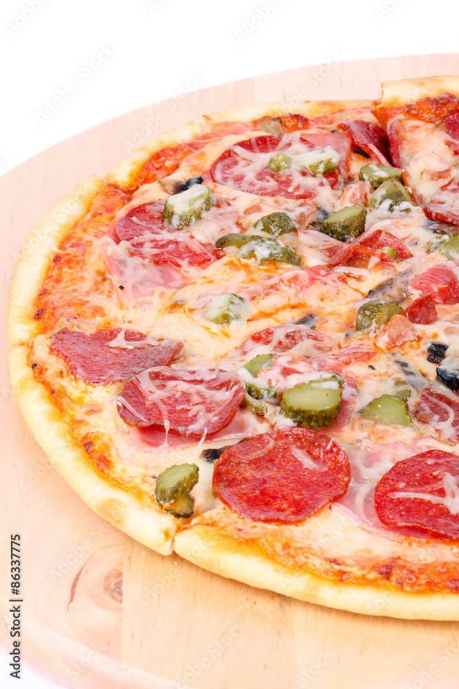 Pizza on wooden board