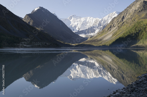 Altai. Morning mountains reflecting in the lake