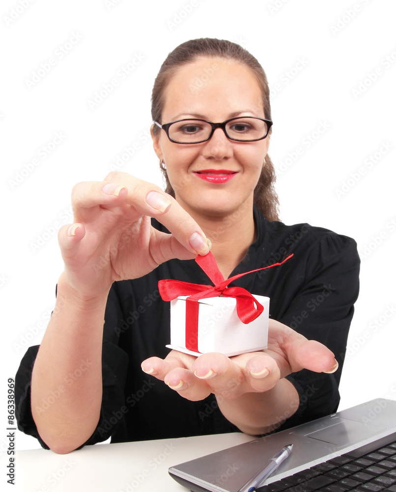 Surprised businesswoman with present box in hand Surprised businesswoman with present box in hand