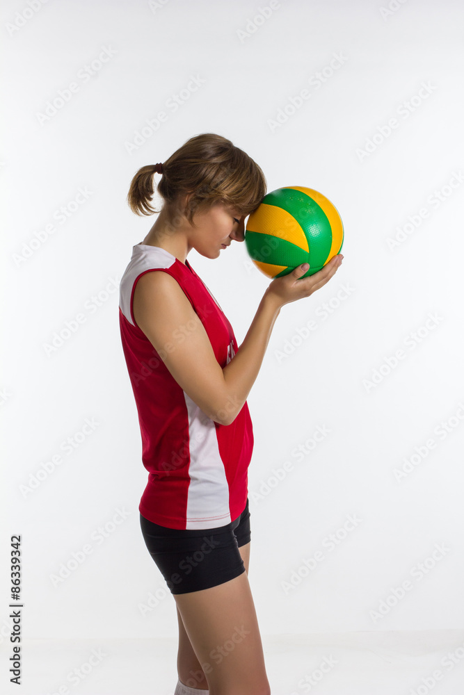 Young sport woman with volleyball ball isolated Young sport woman with volleyball ball isolated