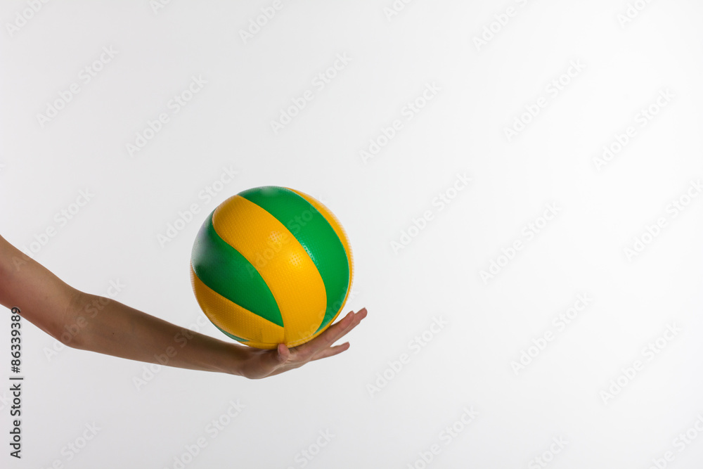 Young  sport woman with volleyball ball isolated