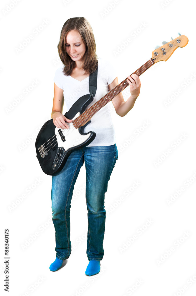 Cute teen girl with electric bass guitar isolated on white background Cute teen girl with electric bass guitar isolated on white background