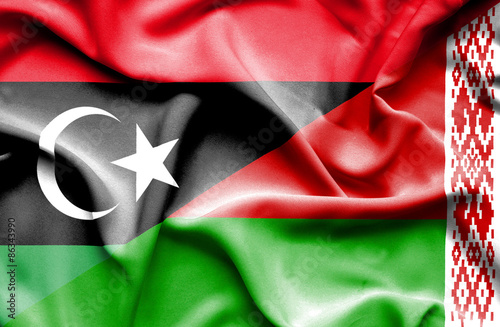 Waving flag of Belarus and Libya