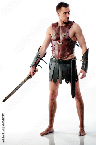 Ancient rome soldier / gladiator with sword isolated on white background