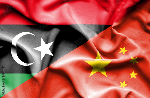 Waving flag of China and Libya
