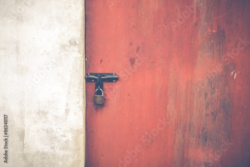 Old red door and white wall