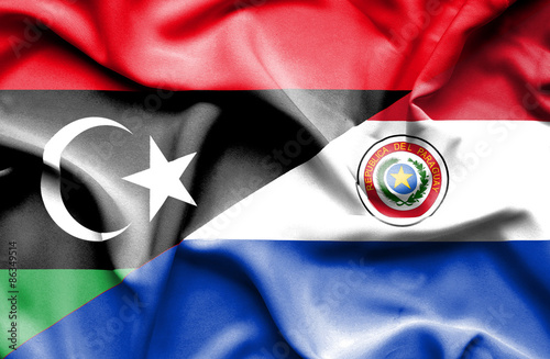 Waving flag of Paraguay and Libya