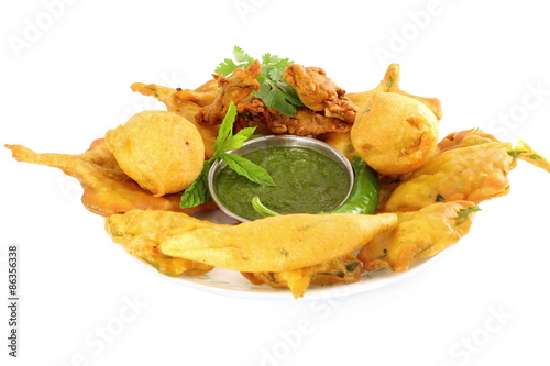 potato vada mix pakoda or fritter indian food snack in pure white background