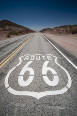 Acrylglasbilder Route 66 Route 66 pavement sign sunrise in California's Mojave desert.  © donvictori0