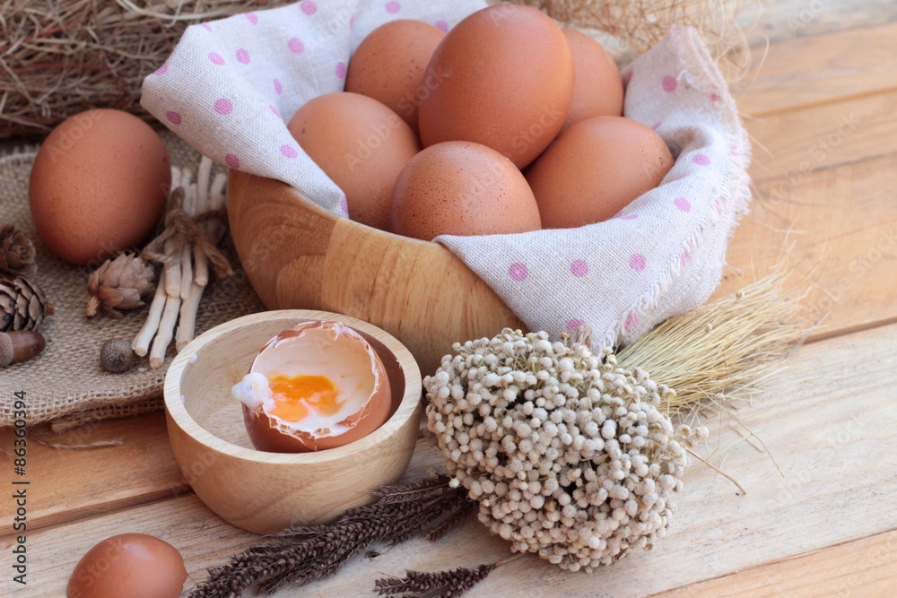soft-boiled egg and eggs on wood background soft-boiled egg and eggs on wood background