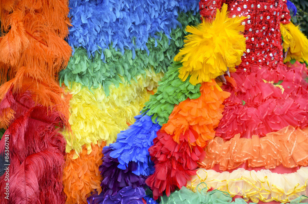 Gay pride rainbow flag dress detail close-up of colorful ruffles 