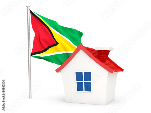 House with flag of guyana