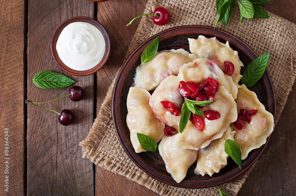Delicious dumplings with cherries and jam Delicious dumplings with cherries and jam