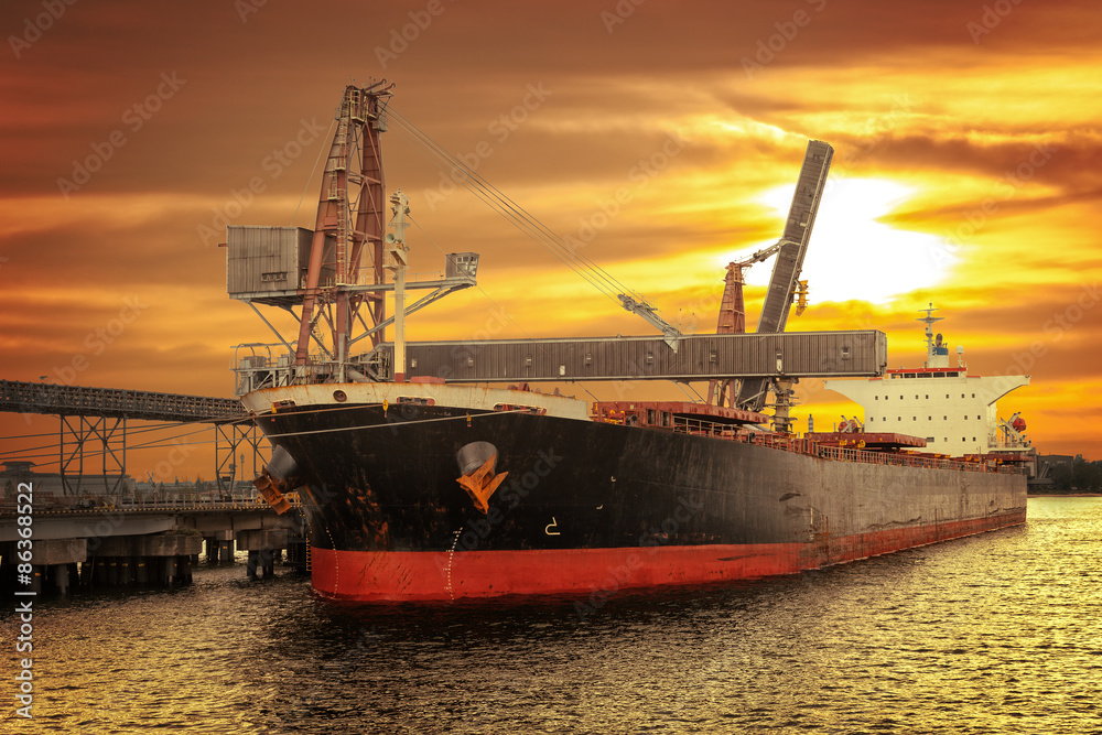 Big ship under loading coal in Port of Gdansk, Poland.