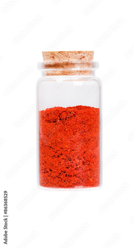 Powdered pimienta roja red pepper in a glass bottle with cork st Powdered pimienta roja red pepper in a glass bottle with cork st