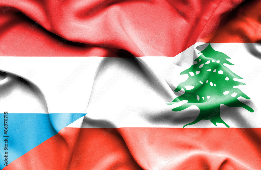 Waving flag of Lebanon and Luxembourg