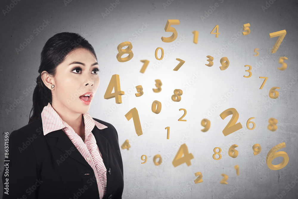 Business woman speaking about number from his mouth Business woman speaking about number from his mouth