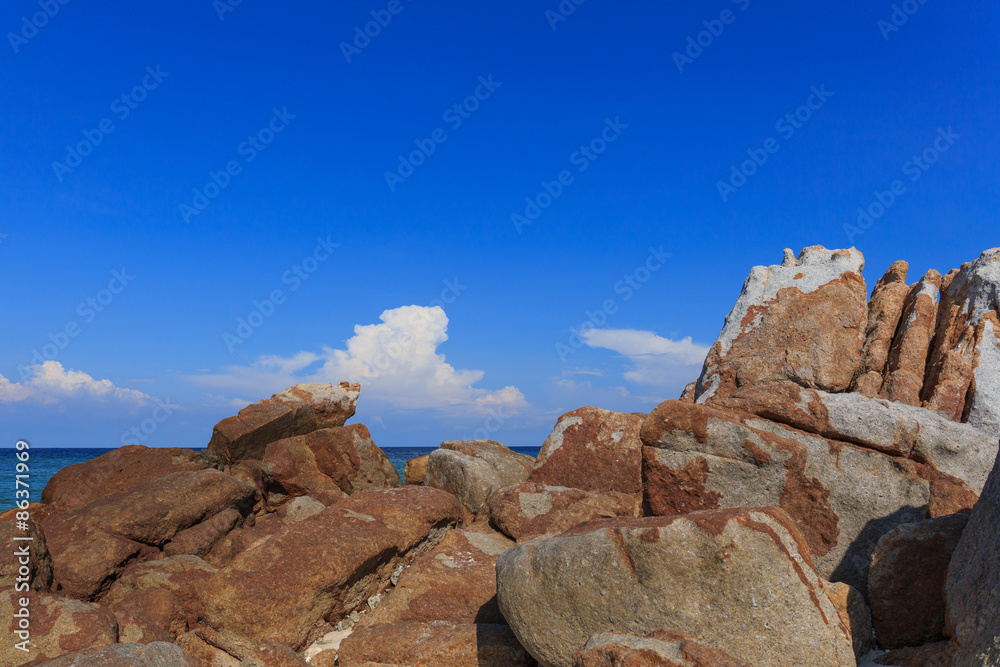 Blue sky and beautiful rock at the beach