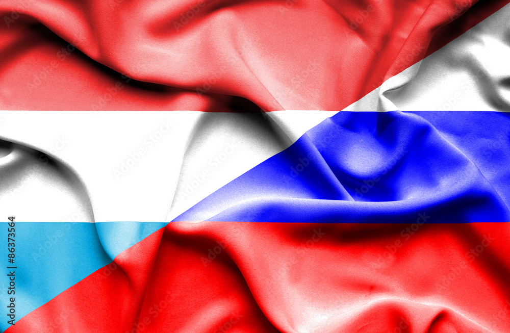 Waving flag of Russia and Luxembourg Waving flag of Russia and Luxembourg