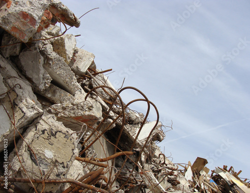 Rubble and twisted metal skyline on a demolition site