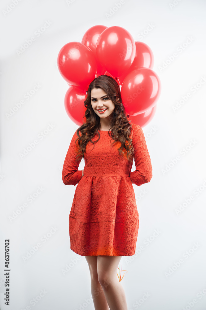 Attractive young woman with pretty smile celebrates Attractive young woman with pretty smile celebrates