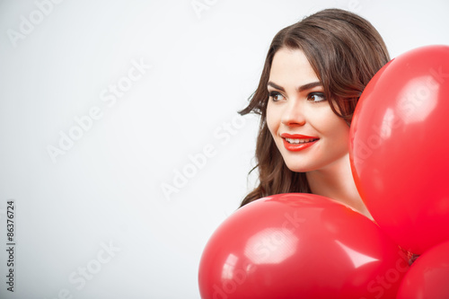 Attractive girl with pretty smile is celebrating