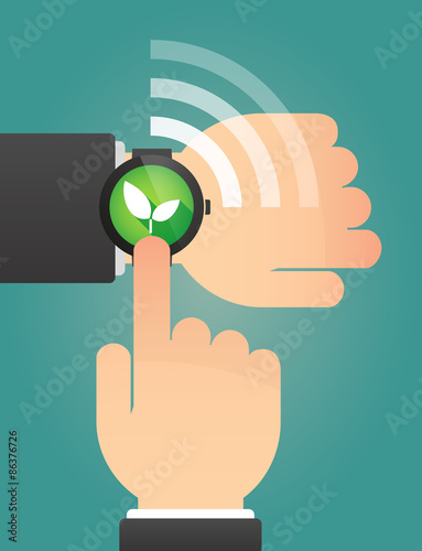 Hand pointing a smart watch with a plant