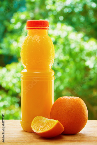 Orange and juice on the table