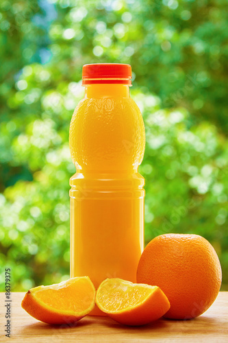 Orange and juice on the table