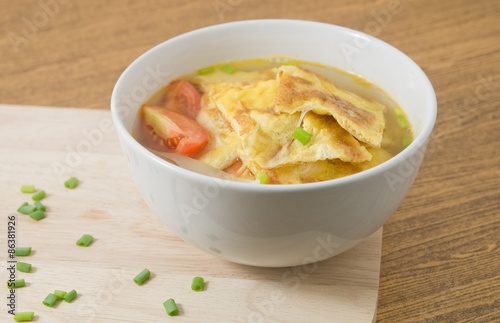 Delicious Thai Omelet Soup with Tomatoes, Onion and Scallion