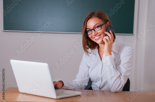 Young girl talking on the phone